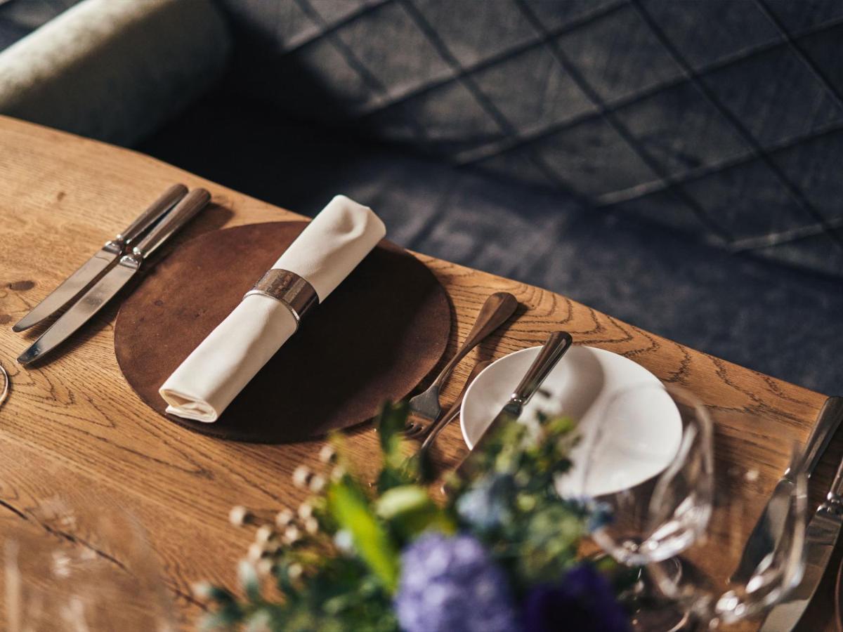 A-Rosa Ifen Hotel Kleinwalsertal Hirschegg (Vorarlberg) Exterior foto A place setting at a restaurant